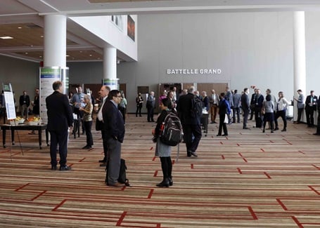 Photo: conference attendees during a session break at the battelle conference on innovations in climate resilience