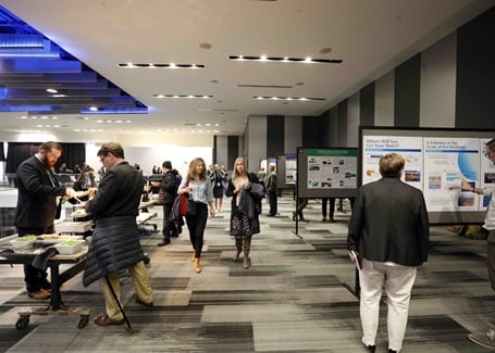 Photo: conference attendees at the poster sessions at the battelle conference on innovations in climate resilience